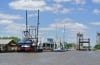 shrimp boats docked along the canal in Delcambre