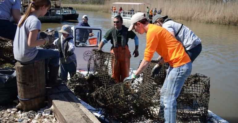 People returning derlict crab traps