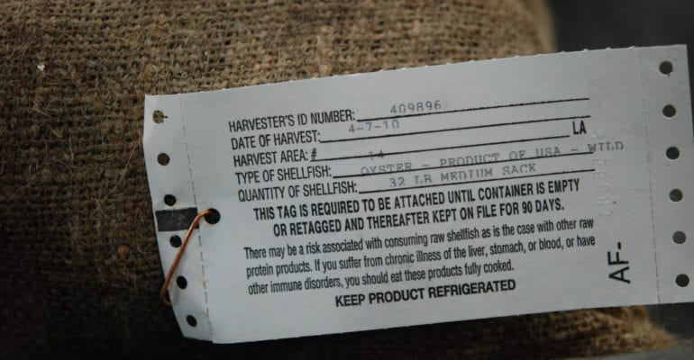 white tag on oyster sack